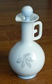 Art Deco style: 
Jug with handle 
and stopper in 
"Løvfald" 
(Falling 
Leaves)  from 
Bing & 
Grondahl. ...