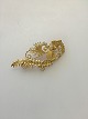 Georg Jensen 
18K guld Broche 
No 53 fra 
1933-1944. 
Måler 6,1 cm x 
3 cm. Vægt 10 
gram