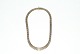 Murstens 
halskæde med 
forløb 7 rk, 14 
Karat Guld
Stemplet: 585, 
SVG
Længde 40 cm.  
...