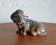 Siddende 
gravhund (nr. 
3140) af Th. 
Madsen for 
Royal 
Copenhagen. 
1. sort. 
Perfekt stand. 
...