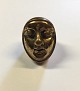Brass ring 
designed by 
Jane?. Ring 
Size 48. Weighs 
35g /1.24oz