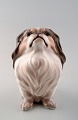 Dahl Jensen 
figur af 
pekingeser.
Dekorationsnummer 
1003.
1. sortering.
Måler 13 x 12 
cm.
