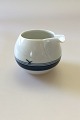 Bing & Grondahl 
Corinth Creamer 
No 303. Height 
measures 6 cm 
(2 23/64 in.)