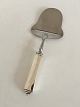 Georg Jensen 
Pyramid 
Sterling Silver 
Cheese Plane No 
222. Measures 
20 cm / 7 7/8".