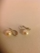 Perle Øre 
clips.
Hvid Guld 14k 
585
Sautsea perler 
9 mm.
Nypolert og 
flot.
kontakt
Telefon  ...