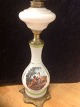 petroliums lamp 
of mouth-blown 
white opaline 
glass.
Height: 79.5 
cm with screen.
nice and well 
...