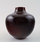 Unique Royal Copenhagen oxblood glaze ceramic vase.
