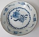 Dutch 
earthenware 
plate, 17th 
century. 
Decorated with 
tulip on the 
mirror. The 
Dutch style. 
1625 ...