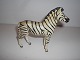 Zebra i Lineol, 
Tyskland - ca. 
1940. Højde: 10 
cm. - længde: 
10 cm. Et øre 
knækket ellers 
i ...