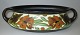 Gouda 
jardiniere 20th 
century. 
Netherlands. 
Cream with 
overglaze in 
brown, black, 
green and red. 
...