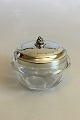 Georg Jensen 
Sterling Sølv 
og Baccarat 
Krystal 
Confiture Glas 
No 486. Måler 9 
cm Ø og 6,5 cm 
H. ...