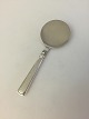 Cohr Olympia 
Muffin/cake 
Server with 
silver handle.
Measures 19.5 
cm L (7 43/64") 

Weighs 85 ...