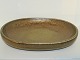 Royal Copenhagen art pottery
Large oblong fruit bowl with Solfatara glaze by Nils Thorsson