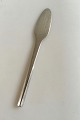 Georg Jensen 
Stainless 
'Prism' Matt 
Butter Knife. 
Measures 16.3 
cm / 6 27/64 
in.
