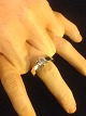 Ring with 
Brilliant Cut 
and zircon.
silver 925 
book (gold and 
silver design - 
Horsens ...
