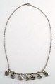 Danish design 
sterling silver 
necklace with 
stones in 
modern design.
Stamped: 830
In fine ...