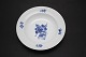 Royal 
Copenhagen, Blå 
blomst flettet, 
dyb frokost- 
eller 
desserttallerken.
 Nr. 10/8105. 
Diameter ...