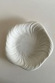 Royal 
Copenhagen Hvid 
Konkylie 
Middagstallerken 
No 14172 (624). 

Måler 24,5 cm. 
Designet af ...