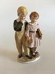 Royal 
Copenhagen 
Overglaze 
figurine of 
"The flight to 
America" No 
1761.
Measures 21cm 
x 11cm ...