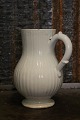 Fransk 1800 
tals glaseret 
stentøjs vin 
kande med hank 
og en rigtig 
fin patina. 
Måler: H:20cm.