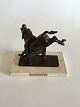 Royal 
Copenhagen 
Bronze 
statuette 
Sterett-
Gittings Kelsey 
af rytter.
Måler 17cm x 
17cm