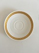 Royal 
Copenhagen Gold 
Fan Saucer No 
11539. 16 cm (6 
19/64")
In Stock: 1
