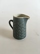 Bing & Grondahl 
Kronjyden Green 
Azur Creamer. 
Measures 11 cm 
/ 4 21/64 in.
