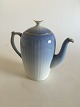 Bing and 
Grondahl 
Ballerina with 
Gold Coffe Pot 
No. 301
Measures 21.5 
cm (8 15/32")
