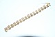 Guld Armbånd, 
14 Karat Guld
Stemplet: 585,
Længde 19 cm. 
Bredde 15,2 
mm. 
Tykkelse ...