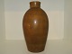 Royal Copenhagen art pottery
Vase with leaf decoration by Nils Thorsson from 1944