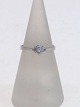 Ring i 14 karat 
hvidguld med en 
brillant 0,02 
ct. 
Ringstr. 52 
Ø16,5
Lavet af Povl 
...