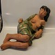 Copenhagen 
Stoneware  
Helge 
Christoffersen 
Woman laying 25 
x 50 cm 
chamotte og 
green glaze. In 
...