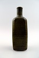 Stor Stig 
Lindberg 
(1916-1982), 
Gustavsberg 
Studio 
keramikvase. 
Glasur i brune 
nuancer, ca. 
...