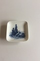 Royal 
Copenhagen 
Plaquette 
2985-16-985.
Women in 
national 
dresses and 
sheep.
8,3cm x 8,3cm 
...