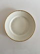 Bing & Grondahl 
Aakjaer 
Luncheon Plate 
No 26. Creme 
with Gold 
Border. In good 
condition. 21.5 
cm.