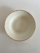 Bing and 
Grondahl 
Aakjaer Large 
Soup Plate No. 
22. Creme with 
Gold Border. In 
good condition. 
...