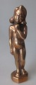 Dansk kunstner 
(20. årh.): 
Nøgen pige. 
Støbt bronze. 
På 8 kantet 
fod. H.: 17,0 
cm.
Denne figur 
...