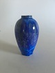 Royal 
Copenhagen 
Crystalline 
Glaze in Blue
Measures 15 cm 
tall (5 29/32")