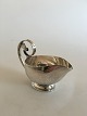 Georg Jensen 
Sterling Sølv 
Sovse/Flødekande 
nr. 321A. Vejer 
198 g. 11 cm Ø. 
10.5 cm høj. 
Fra ...