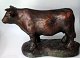 Hansen 
Reistrup, Karl 
(1863 - 1929) 
Denmark: The 
bull 
"S&oslash;lyst".
 Sculpture. 
Painted reds. 
...