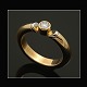 Georg Jensen 
Ring i 18 kt 
guld & Hvidguld 
med 0,20 ct 
diamant.
Stemplet med 
efter-1945 ...