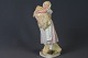 Porcelain 
Figure: Royal 
Copenhagen, 
Bond Girl with 
neg, h: 19 cm