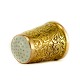 A 14k gold thimble