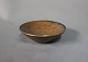 Lille keramik 
saltkar i brune 
farver af L. 
Hjort Danmark, 
nr.: 028.
Dia - 8 cm.