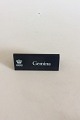 Royal 
Copenhagen 
Forhandler 
Reklame Skilt i 
Plastik 
"Gemina".
Måler 10,5cm x 
4,2cm