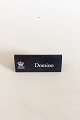 Royal 
Copenhagen 
Forhandler 
Reklame Skilt i 
Plastik 
"Domino".
Måler 10,5cm x 
4,2cm