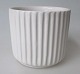 Fluted vase, 
Michael 
Andersen, 
Bornholm, 
Denmark, app. 
1950. White 
glazed. H .: 
7.5 cm. Dia .: 
...