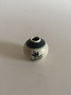 Royal 
Copenhagen 
Miniature Vase 
i Jernporcelæn 
No 102/144. 2 
sort. 4.5 cm H.