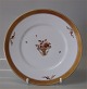 24 stk på lager
 10519-595 
Middagstallerken 
26 cm  Royal 
Copenhagen Guld 
dekoration på 
hvidt ...