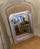Smukt Louis 
Philippe sølv 
spejl med 
originalt 
spejlglas. 
Fin blad 
forsølvet 
ramme.
Mål 34x40cm.